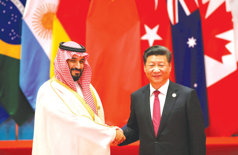  CHINESE PRESIDENT Xi Jinping meets with then-Saudi deputy crown prince Mohammed bin Salman during the G20 Summit in Zhejiang province, China, in 2016. (photo credit: Damir Sagolj/Reuters)