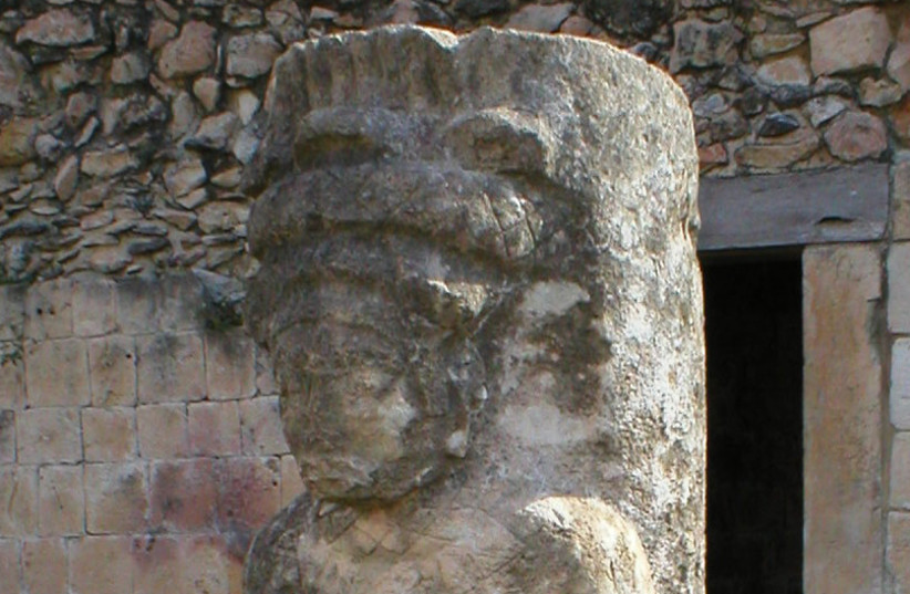 Sculpted Column from the Ancient Maya site of Oxkintok, Yucatan, Mexico. (photo credit: DAVID R. HIXSON/CC BY-SA 2.5 (https://creativecommons.org/licenses/by-sa/2.5)/VIA WIKIMEDIA COMMONS)