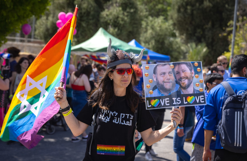  People take part in a rally marking the annual Gay Pride Parade in Jerusalem, on June 3, 2021.  (photo credit: OLIVIER FITOUSSI/FLASH90)