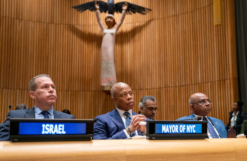 New York City Mayor Eric Adams, President of the United Nations General Assembly Abdulla Shahi and Permanent Representative of Israel to the United Nations Gilad Erdan at United Nations headquarters in New York City, New York, U.S., March 29, 2022. (photo credit: REUTERS/David Dee Delgado)