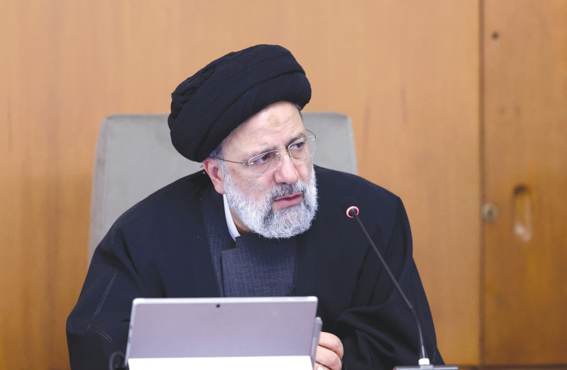  IRANIAN PRESIDENT Ebrahim Raisi speaks during a cabinet meeting in Tehran, last week.  (photo credit: Presidential Website/West Asia News Agency/Reuters)