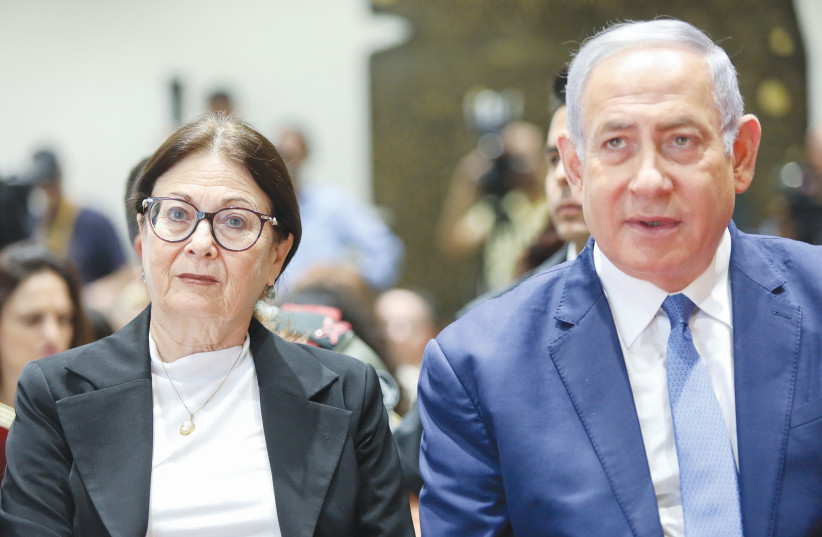 PRIME MINISTER Benjamin Netanyahu and Supreme Court President Esther Hayut attend a ceremony in Jerusalem, in 2019. (photo credit: NOAM REVKIN FENTON/FLASH90)