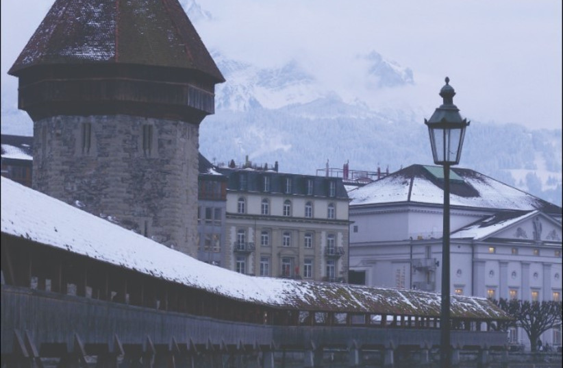  A VIEW OF the 14th century Chapel Bridge in Lucerne.  (photo credit: BARRY BORMAN)