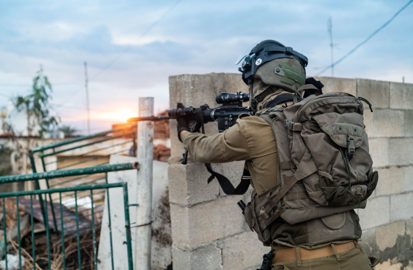  IDF soldiers besiege the homes of Palestinian terror suspects near Jericho, in the West Bank, on February 4, 2023 (photo credit: IDF SPOKESPERSON'S UNIT)