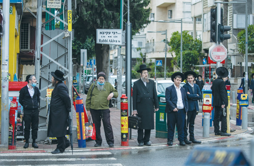  BNEI BRAK: The combination of ultra-Orthodox large families who are unemployed, lack a regular income and the basic education required for knowledge and occupation, has led to extensive poverty among this sector, says the writer. (photo credit: YOSSI ALONI/FLASH90)