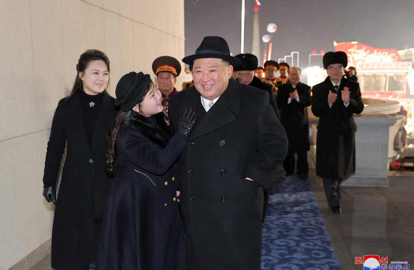  North Korean leader Kim Jong Un, his wife Ri Sol Ju and their daughter Kim Ju Ae attend a military parade to mark the 75th founding anniversary of North Korea's army, at Kim Il Sung Square in Pyongyang, North Korea February 8, 2023. (photo credit: KCNA VIA REUTERS)