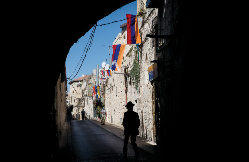  INSIDE THE Armenian Quarter, festooned with flags. (photo credit: NATI SHOHAT/FLASH90)