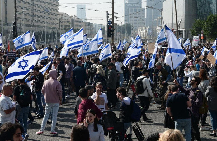  Israelis protest the judicial reform in Tel Aviv, Monday, February 20. (photo credit: AVSHALOM SASSONI/MAARIV)