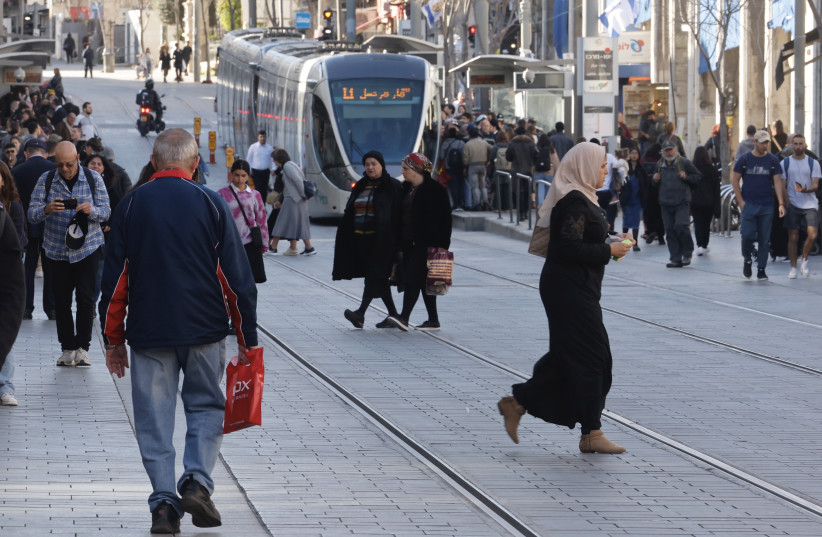  A SCENE in downtown Jerusalem. Although Jews and Muslims remain strangers,  there’s a lot that binds us, whether it be a distrust of government, our goals of providing a good and secure life for our children, and a realization that neither the people of Israel nor the people of Palestine are going  (photo credit: MARC ISRAEL SELLEM/THE JERUSALEM POST)