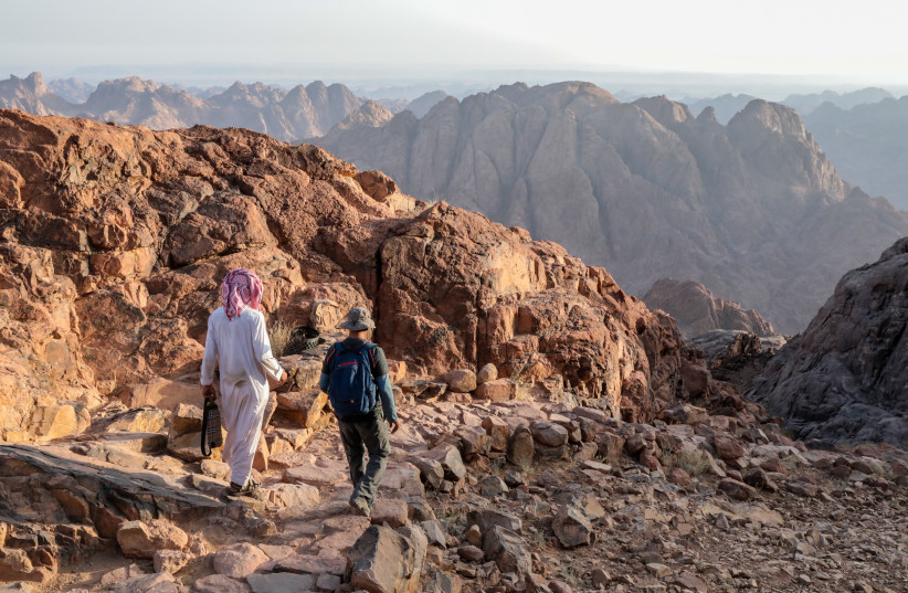  Bedouins and Israeli travellers seen in Jabal Mousa in the Sinai peninsula, Egypt, August 12, 2022.  (photo credit: YOSSI ZAMIR/FLASH90)