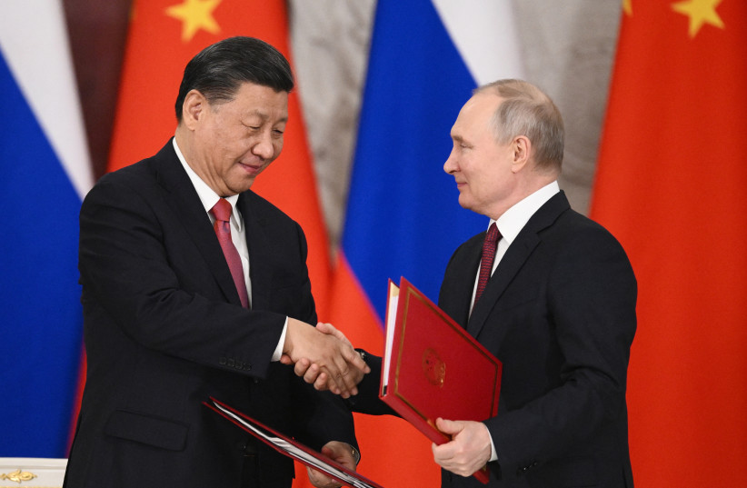  Russian President Vladimir Putin and Chinese President Xi Jinping attend a signing ceremony at the Kremlin in Moscow, Russia March 21, 2023 (photo credit: REUTERS)