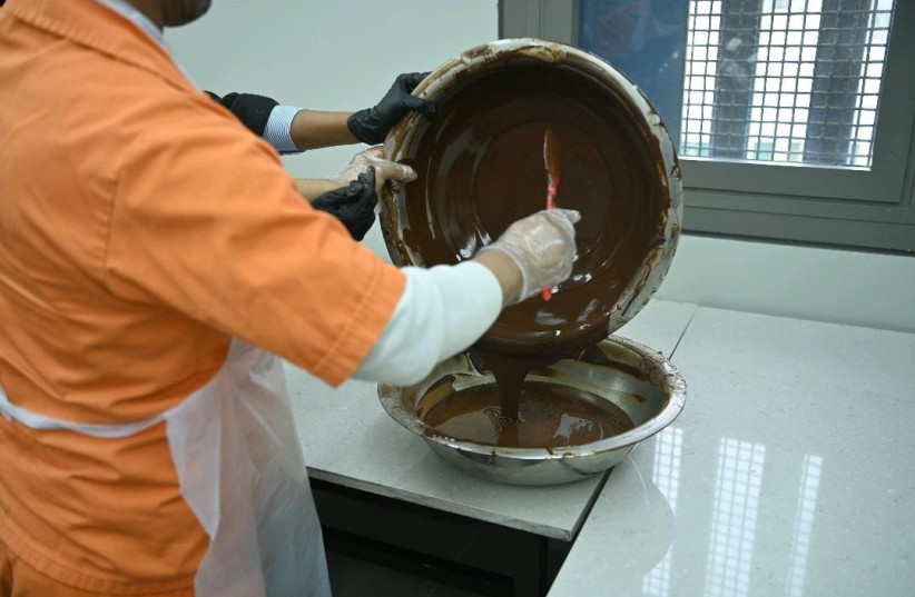  Israeli inmates work at the Magen Nitzan Prison chocolate factory. (photo credit: ISRAEL PRISON SERVICE)