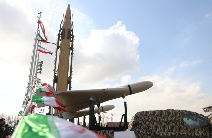  A drone is seen next to an Iranian missile during the 44th anniversary of the Islamic Revolution in Tehran, Iran, February 11, 2023 (photo credit: MAJID ASGARIPOUR/WANA (WEST ASIA NEWS AGENCY) VIA REUTERS)