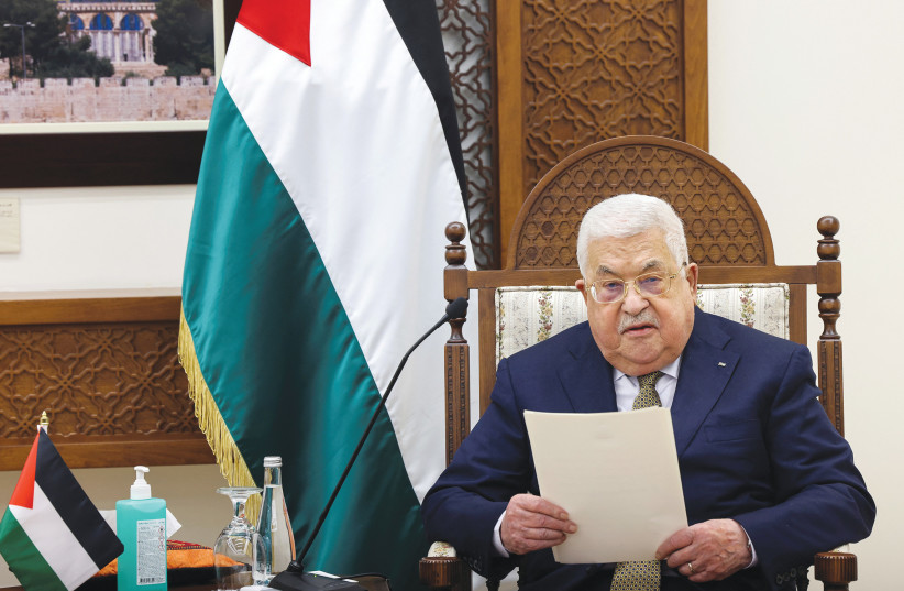  PA HEAD Mahmoud Abbas told Maher Yunis: ‘We are proud of you... You are the beacon of light of this nation. (photo credit: Ronaldo Schemidt/Reuters)