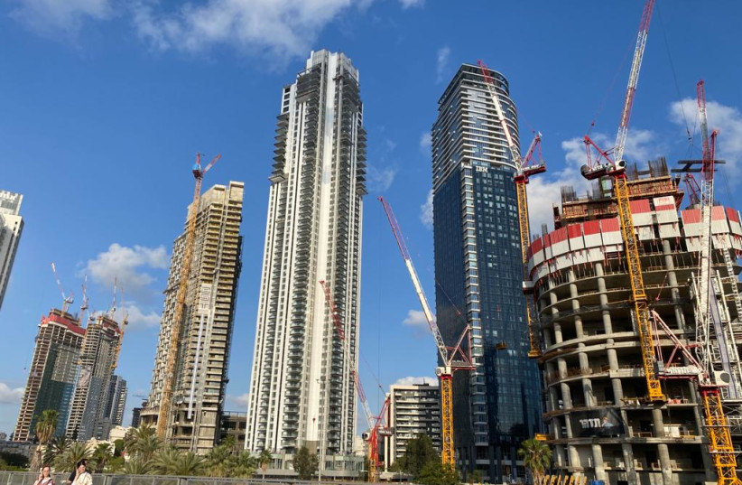 Construction is seen in Tel Aviv on May 7, 2023 (photo credit: AVSHALOM SASSONI/MAARIV)
