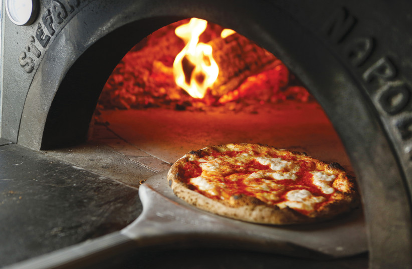  NEAPOLITAN PIZZA at the Pizzeria Dea Bendata.  (photo credit: ENIT)