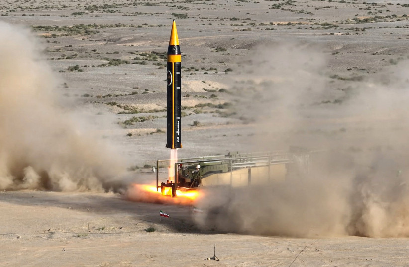 A new surface-to-surface 4th generation Khorramshahr ballistic missile called Khaibar with a range of 2,000 km is launched at an undisclosed location in Iran, in this picture obtained on May 25, 2023. (photo credit: IRANIAN DEFENSE MINISTRY/WANA/VIA REUTERS)