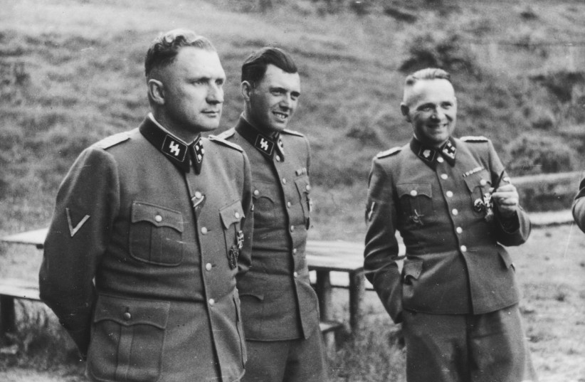  Former Auschwitz commandant Rudolf Höss (right), Dr. Josef Mengele, and Auschwitz Commandant Richard Baer in 1944. (photo credit: UNITED STATES HOLOCAUST MEMORIAL MUSEUM)