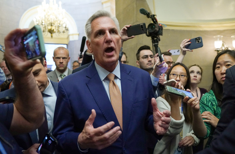  Speaker of the House Kevin McCarthy talks to reporters about the debt ceiling after the departure of White House negotiators, at the U.S. Capitol in Washington, U.S., May 23, 2023 (photo credit: REUTERS/KEVIN LAMARQUE)