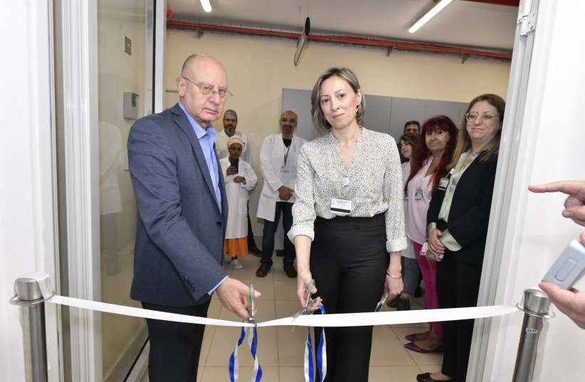  Prof. Masad Barhoum and Dr. Mona Shehadeh cut the ribbon inaugurating the renovated lab. (photo credit: RONI ALBERT/GALILEE MEDICAL CENTER)