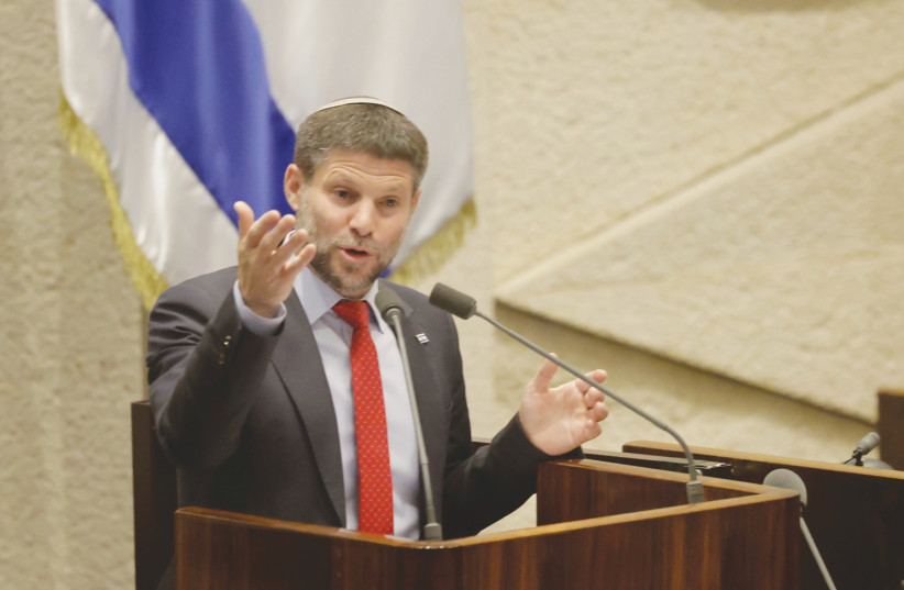  FINANCE MINISTER Bezalel Smotrich addresses the plenum during the state budget debate in the Knesset, last week.  (photo credit: Marc Israel Sellem/Jerusalem Post)