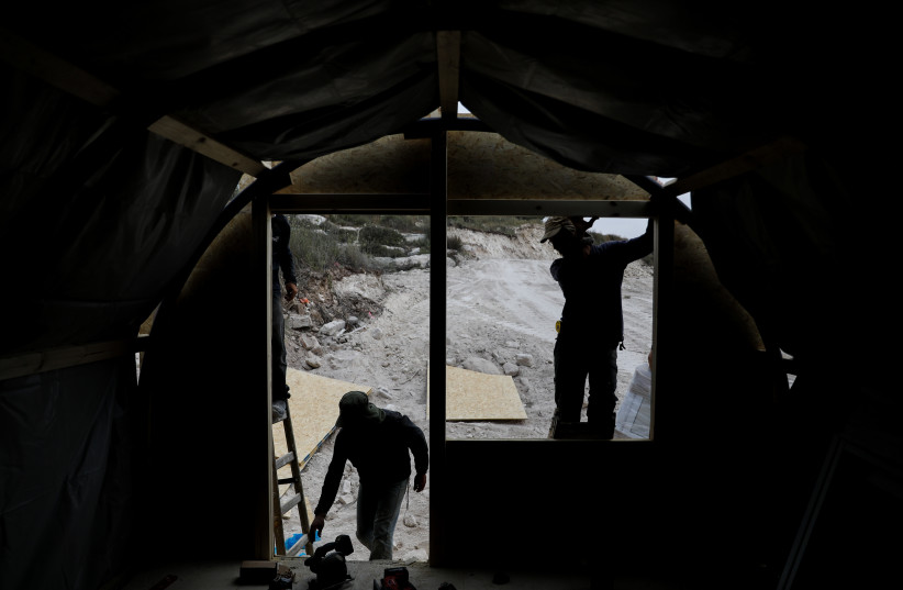  Construction is seen being done on the Homesh outpost in the West Bank, on May 29, 2023. (photo credit: FLASH90)