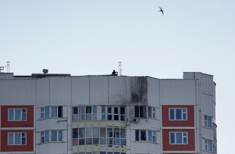 An apartment building burns after being damaged during a massive Russian drone strike, amid Russia's attack on Ukraine, in Kyiv, Ukraine May 30, 2023. (photo credit: REUTERS/MAXIM SHEMETOV)