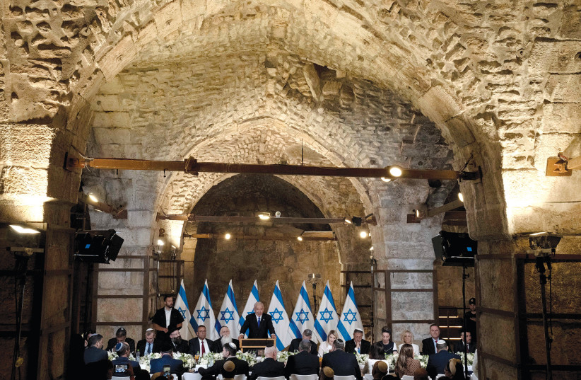  Israeli Prime Minister Benjamin Netanyahu is seen presiding over a cabinet meeting in the Western Wall tunnels in honor of Jerusalem Day, in Jerusalem, on May 21, 2023. (photo credit: MAYA ALLERUZO/POOL/REUTERS)