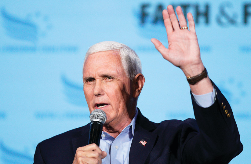  FORMER US vice president Mike Pence speaks at the Iowa Faith & Freedom Coalition Spring Kick-off,  in West Des Moines, in April. (photo credit: Eduardo Munoz/Reuters)