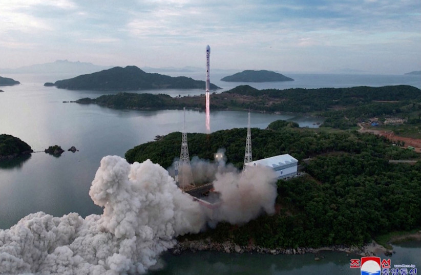  A still photograph shows what appears to be North Korea's new Chollima-1 rocket being launched in Cholsan County, North Korea, May 31, 2023 in this image released by North Korea's Korean Central News Agency and taken from video. (photo credit: KCNA VIA REUTERS)