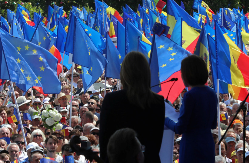  European Parliament President Roberta Metsola and Moldovan President Maia Sandu attend a rally to support the European path of the country, in Chisinau, Moldova May 21, 2023. (photo credit: VLADISLAV CULIOMZA / REUTERS)