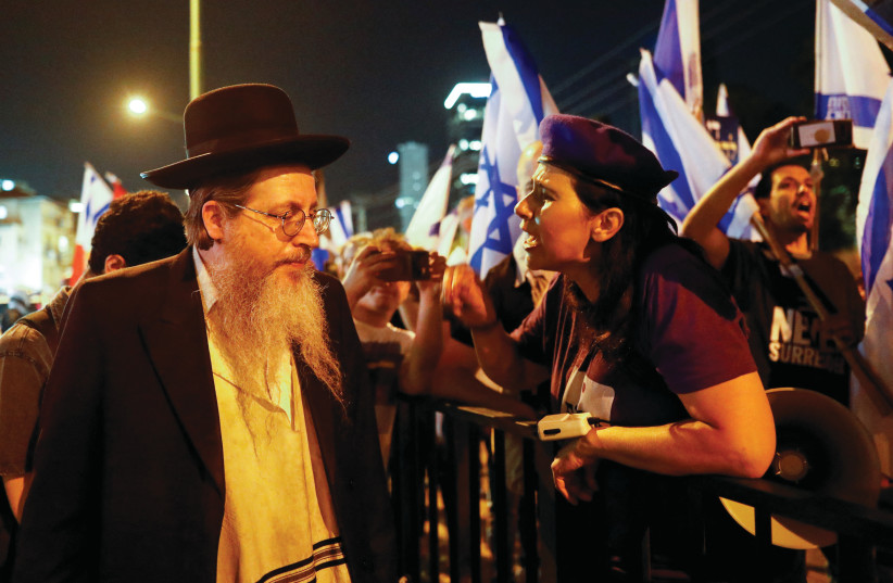  A MARCH from Ramat Gan to Bnei Brak in protest of the haredi community’s monetary demands for the upcoming budget, last month. (photo credit: CORINNA KERN/REUTERS)
