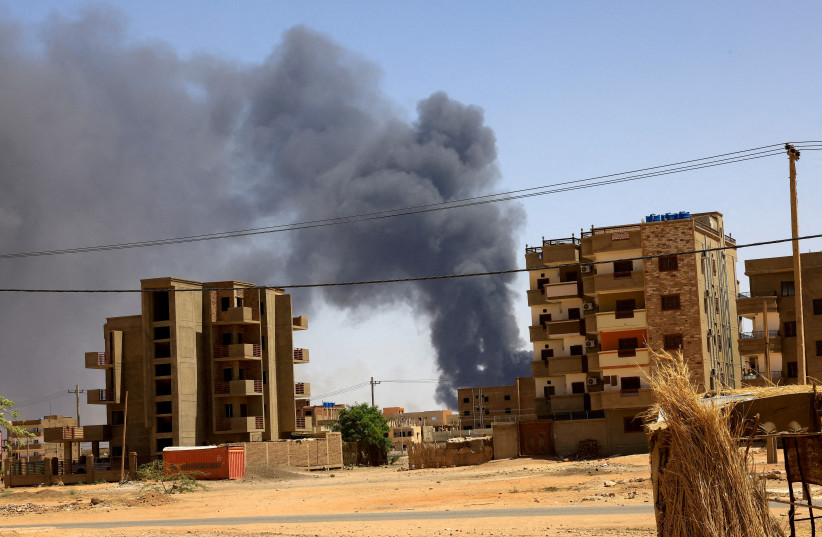  Smoke rises above buildings after an aerial bombardment, during clashes between the paramilitary Rapid Support Forces and the army in Khartoum North, Sudan, May 1, 2023. (photo credit: REUTERS/Mohamed Nureldin Abdallah/File Photo)