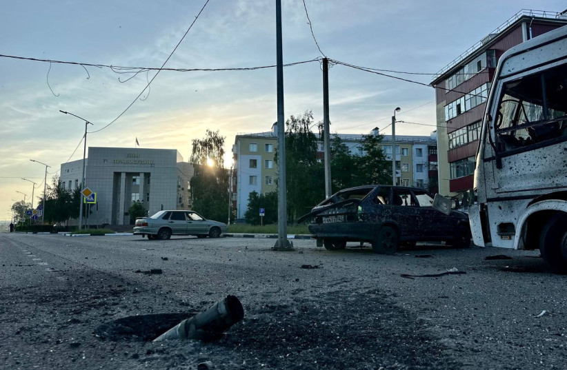  A view shows ammunition casing in a damaged street following what was said to be Ukrainian forces' shelling in the course of Russia-Ukraine conflict in the town of Shebekino in the Belgorod region, in this handout image released May 31, 2023. (photo credit: Governor of Russia's Belgorod Region Vyacheslav Gladkov via Telegram/Handout via REUTERS)
