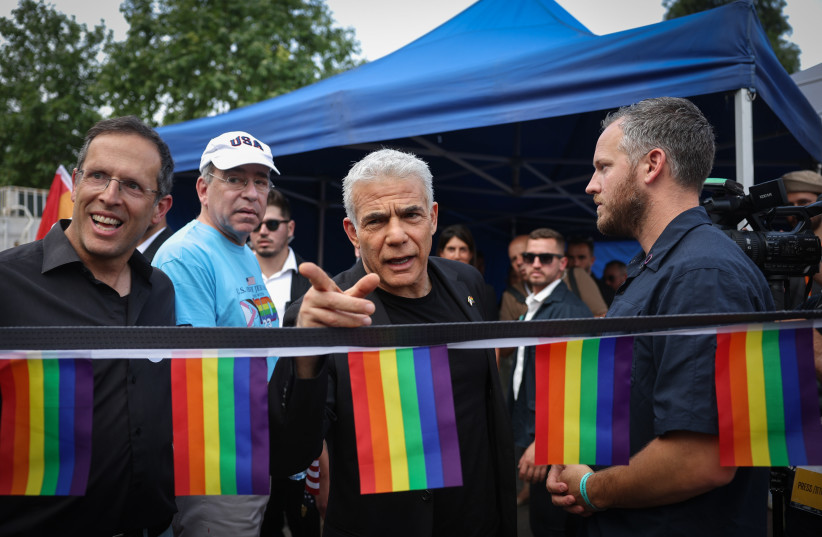  Opposition leader Yair Lapid attends at the annual Jerusalem Pride Parade, on June 1, 2023 (photo credit: YONATAN SINDEL/FLASH90)