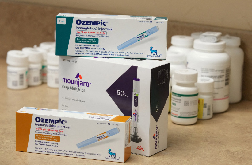  Boxes of Ozempic and Mounjaro, semaglutide and tirzepatide injection drugs used for treating type 2 diabetes and made by Novo Nordisk and Lilly, is seen at a Rock Canyon Pharmacy in Provo, Utah, US March 29, 2023. (photo credit: REUTERS/GEORGE FREY)
