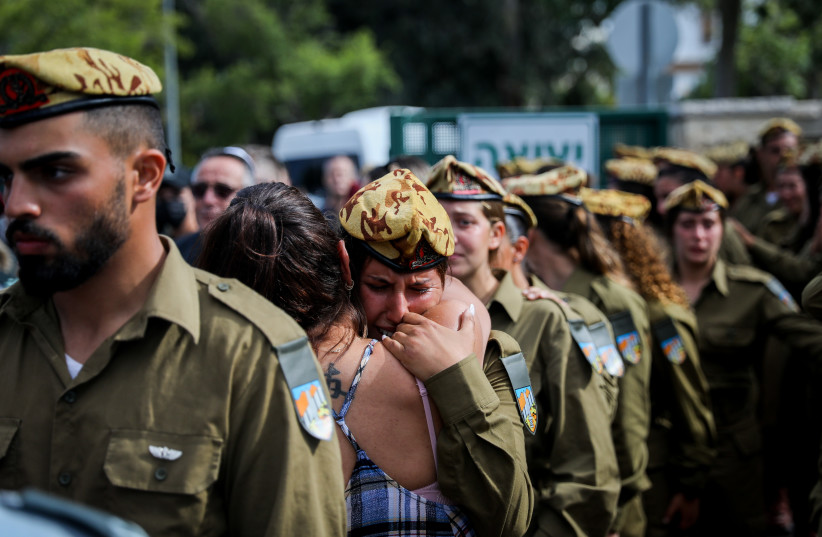  Family and friends attend the funeral of Sgt. Lia Ben Nun who was murdered on the Egyptian border yesterday, at the Military cemetery in Rishon Lezion, June 4, 2023.  (photo credit: FLASH90)