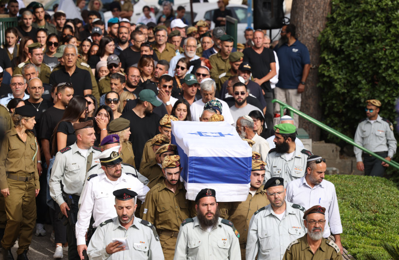  Family and friends attend the funeral of Staff Sergeant Ori Izhak Iluz who was murdered on the Egyptian border yesterday, at the Military cemetery in Tzfat, June 4, 2023 (photo credit: David Cohen/Flash90)