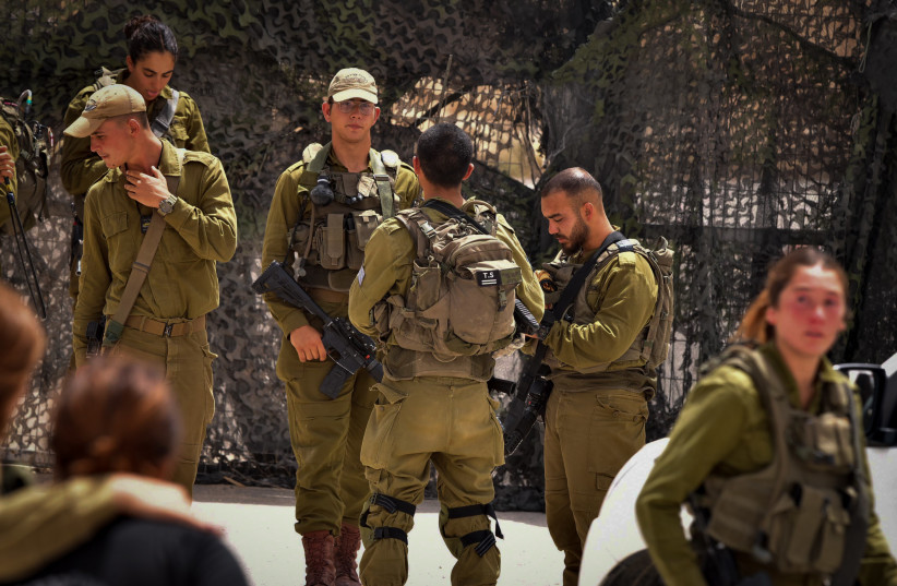  Israeli soldiers and rescue forces seen at Mount Harif military base in the southern Negev desert, close to the border with Egypt, on June 3, 2023 (photo credit: DUDU GREENSPAN/FLASH90)