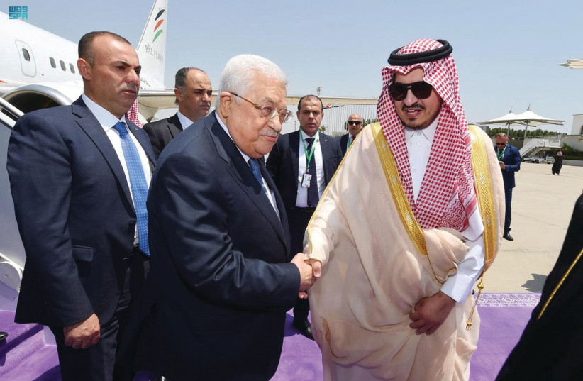  PALESTINIAN AUTHORITY head Mahmoud Abbas is received by Prince Badr Bin Sultan, as he arrives to attend the Arab League Summit in Jeddah, last month. (photo credit: SAUDI PRESS AGENCY/REUTERS)