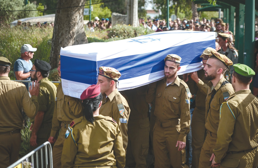  THE FUNERAL of Sgt. Lia Ben-Nun takes place in Rishon Lezion, on Sunday, a day after she was killed at the Egyptian border. (photo credit: AVSHALOM SASSONI/FLASH90)