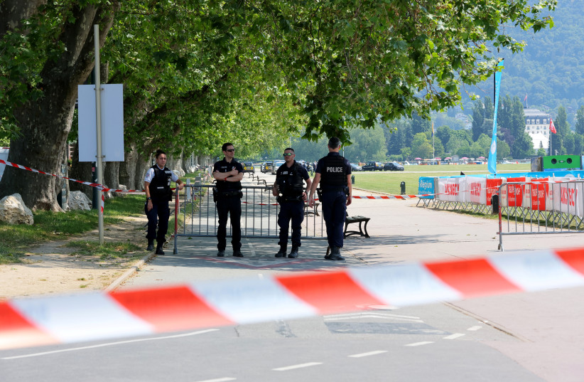  French police secure the area after several children and an adult have been injured in a knife attack in Annecy, in the French Alps, France, June 8, 2023 (photo credit: REUTERS/DENIS BALIBOUSE)