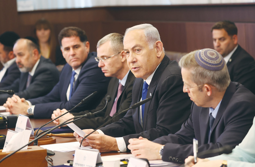  PRIME MINISTER Benjamin Netanyahu addresses the cabinet this week. He convened a war drill and issued a public threat at the security cabinet, saying that Israel can handle the threat from Iran on its own.  (photo credit: Amit Shabi/Flash90)