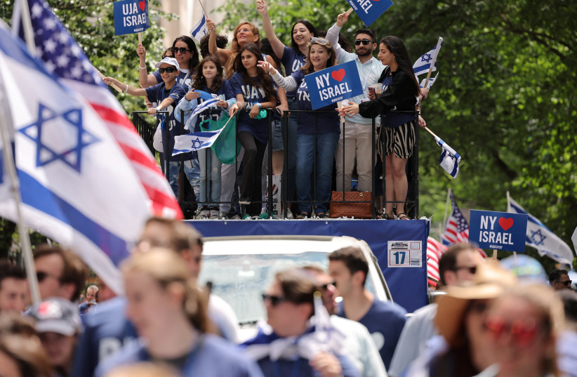  People take part in the "Celebrate Israel" parade in New York, U.S., June 4, 2023 (photo credit: REUTERS/AMR ALFIKY)