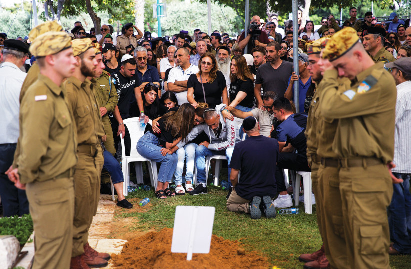  FRIENDS AND family mourn at the funeral in Rishon Lezion on Sunday of Sgt. Lia Ben-Nun, who, along with two other soldiers, was killed a day earlier by a member of the Egyptian security services near Israel’s border with Egypt. (photo credit: SHIR TOREM/FLASH90)