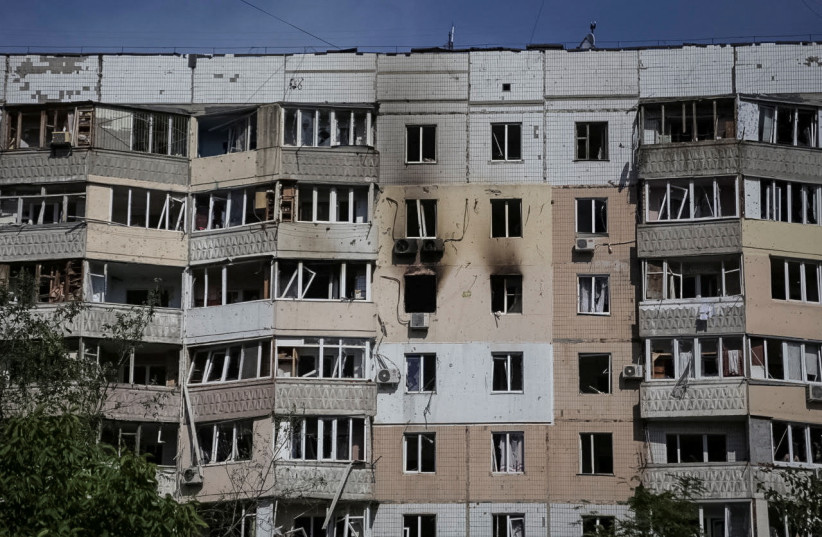  A view shows an apartment building damaged during a massive Russian drone strike, amid Russia's attack on Ukraine, in Odesa, Ukraine June 10, 2023. (photo credit: REUTERS/Serhii Smolientsev)