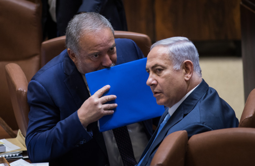  Defense Minister Avigdor Liberman and Prime Minister Benjamin Netanyahu attend the special plenary session opening the winter session of the Knesset, on October 23, 2017.  (photo credit: HADAS PARUSH/FLASH90)