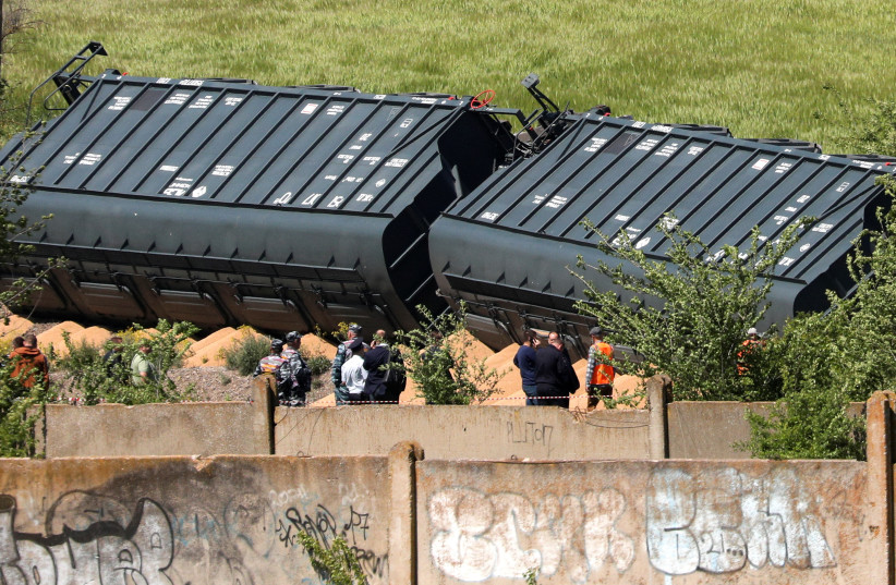  A view shows derailed wagons following an accident involving a freight train carrying grain in the Simferopol District, Crimea, May 18, 2023. (photo credit: REUTERS)