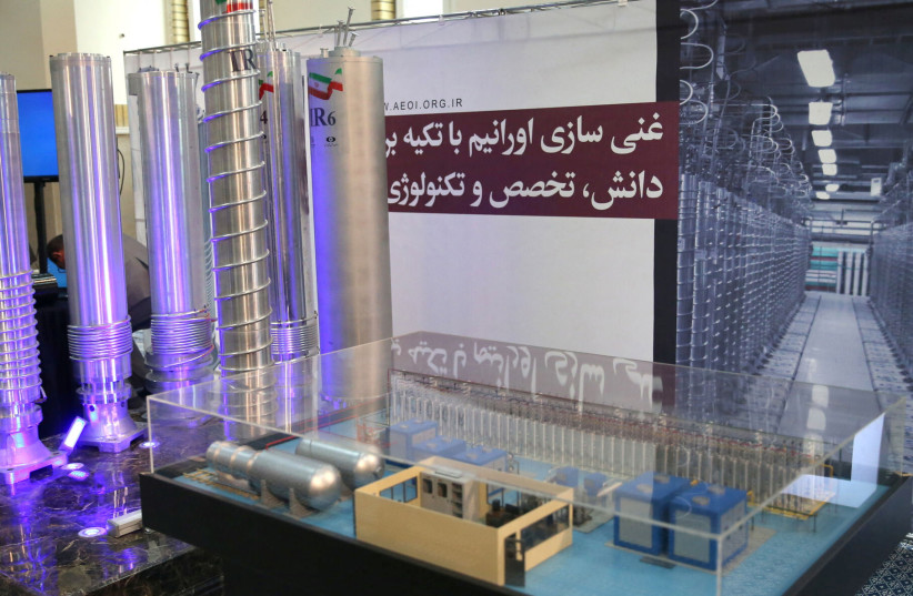  Iranian centrifuges are seen on display during a meeting between Iran's Supreme Leader Ayatollah Ali Khamenei and nuclear scientists and personnel of the Atomic Energy Organization of Iran (AEOI), in Tehran, Iran June 11, 2023. (photo credit: Office of the Iranian Supreme Leader/WANA (West Asia News Agency) via REUTERS)