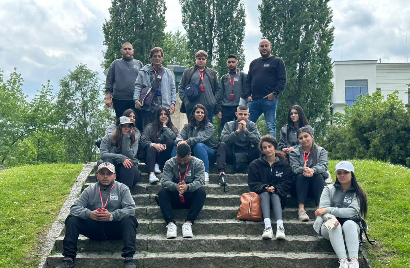  The entire young Atidna group at the Holocaust and Courage monument. (photo credit: Ismail Hajj Yehye)